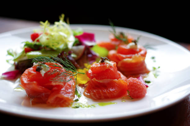 istock Rolled salmon sashimi salad with caviar and cream 1498454332