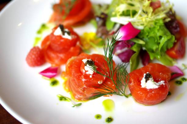 istock Rolled salmon sashimi salad with caviar and cream 1498454340