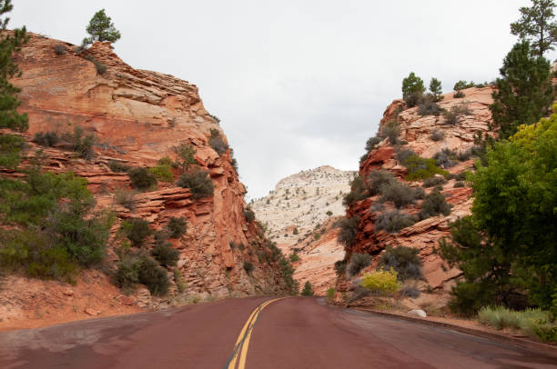 istock Western U.S. highway through red rock mountains 1498454749