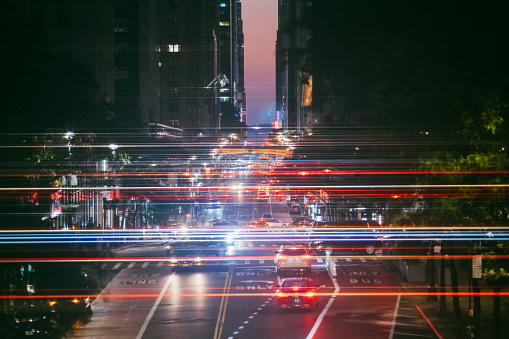 Traces of cars traveling on night highway