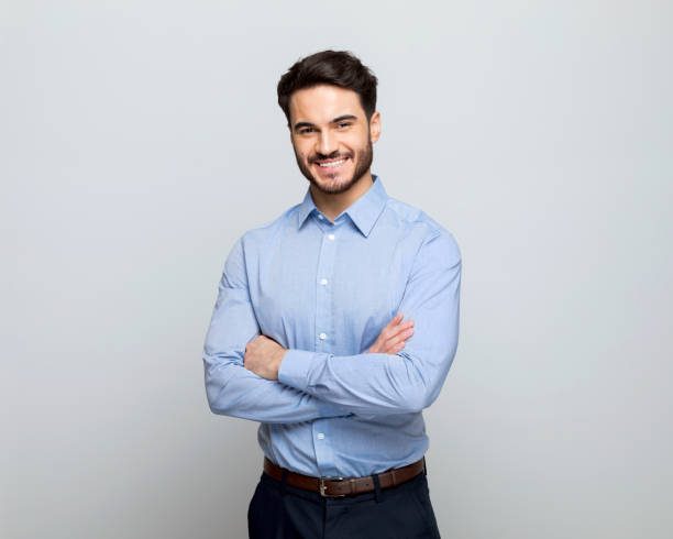 istock Young businessman smiling at camera 1498457191