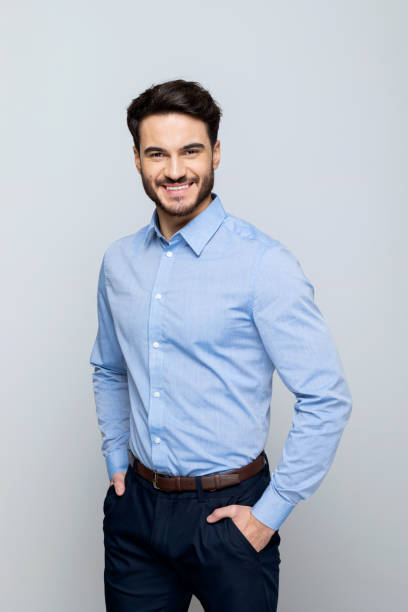 istock Young businessman smiling at camera 1498457212