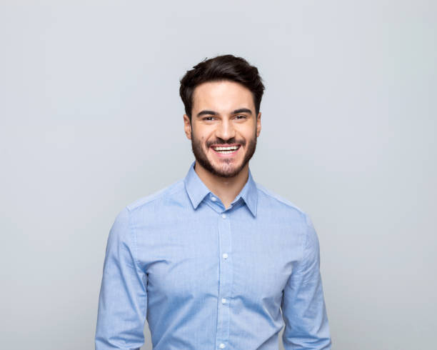 istock Young businessman smiling at camera 1498457252