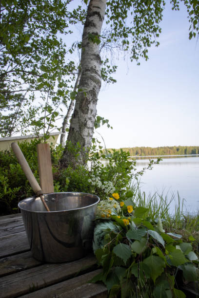 istock birch whisk used in sauna, dock in Finland, midsummer 1498463709