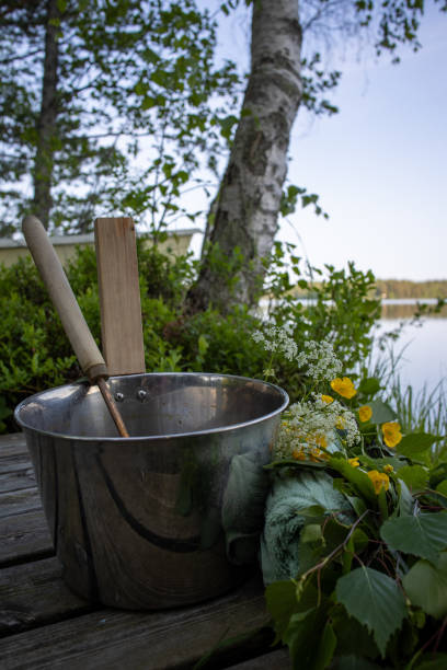 istock birch whisk used in sauna, dock in Finland, midsummer 1498463725
