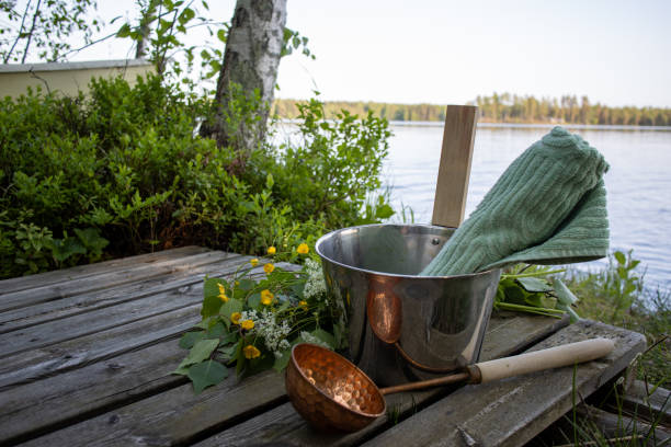 birch whisk used in sauna, dock in finland, midsummer - finland sauna lake house imagens e fotografias de stock