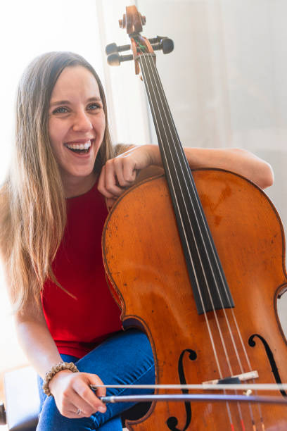 istock Artistry in Motion: Professional Cellist Practicing for Upcoming Concert 1498464154
