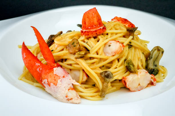 istock Spaghetti with lobster and wild mushrooms 1498465877
