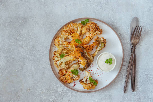 istock Grilled cauliflower steak with spices and 1498468672