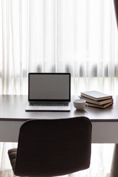 istock Notebook computers are geared up for online work because it's when companies allow working from home. The concept of working from home with Notebook via online system. Copy space for text 1498468688