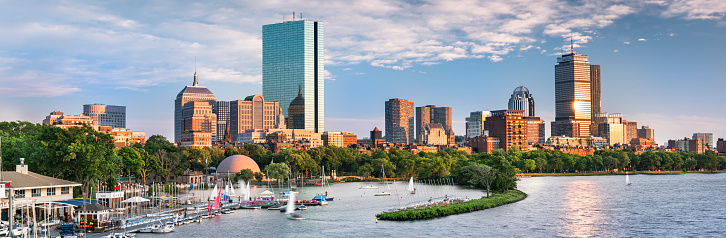 Boston, Massachusetts, USA – July 19, 2022:  Boston Massachusetts USA downtown city skyline of the office buildings, apartments and sailing Marina along the Esplanade