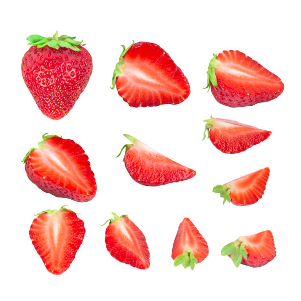 istock strawberries, ripe strawberries are cut into different pieces isolated from the background 1498474097