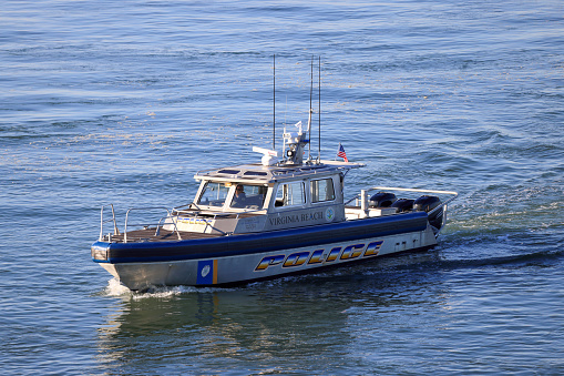 Virginia Beach, VA, USA - November 10, 2021: A Virginia Beach Police boat patrolling the Chesapeake Bay.