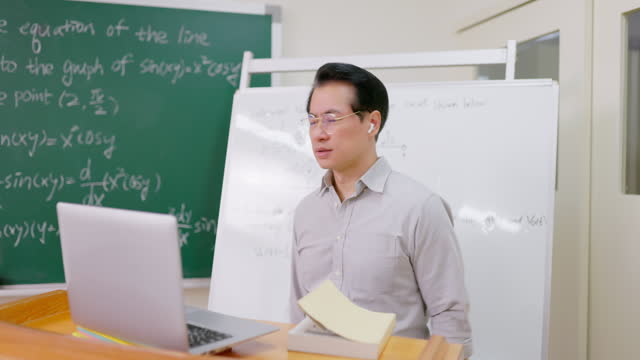 male professor teaching online