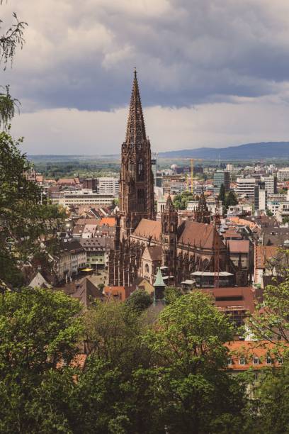 istock a clock tower rises above the city skyline as it reaches the top 1498483349