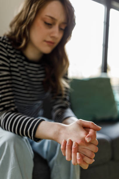 istock Anxious young woman nervously cracking her knuckles 1498485140