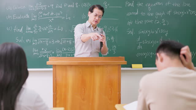 Senior professor teaching calculus