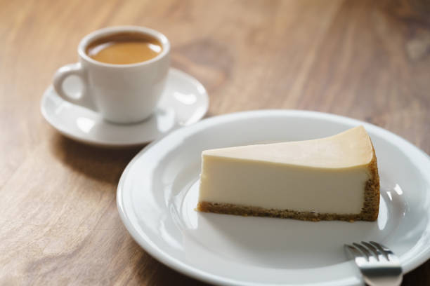 istock fresh espresso and cheesecake on table 1498490339