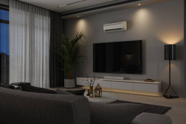 modernes wohnzimmer in der nacht mit fernseher, klimaanlage und sofa - air conditioner window heat hot day stock-fotos und bilder