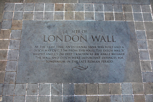 London, UK - March 2nd 2023: A stone plaque or marker, marking the location of where the London Wall once stood, in London, UK.