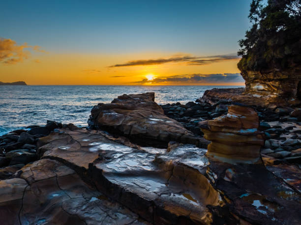 istock Sunrise and sunrays over the ocean 1498497508