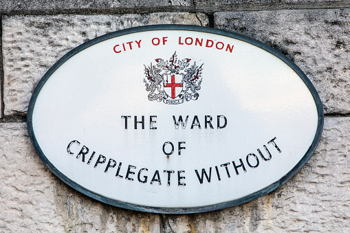 London, UK - March 2nd 2023: A sign marking the location of the ward of Cripplegate Without in the City of London, UK.