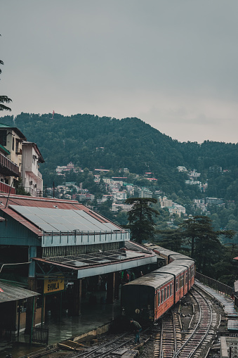View of Shimla railway station on a rainy day - Kalka Shimla Toy Train - UNESCO World Heritage Site - Rail Transportation