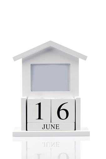 White vintage wood block calendar present date 16 and month June