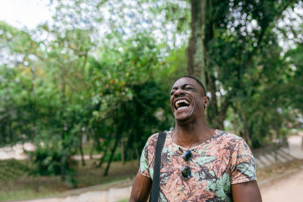 istock Young man laughing outdoors 1498520653