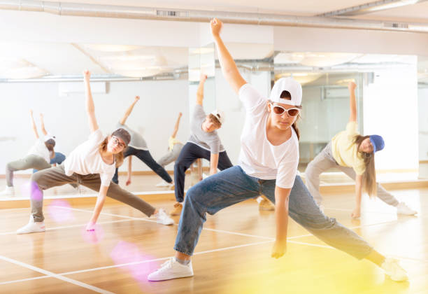 istock Teenagers training hip hop in dance studio 1498522950