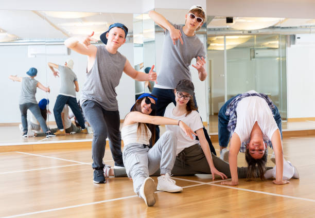 istock Teens hip hop dancers posing in studio 1498522954