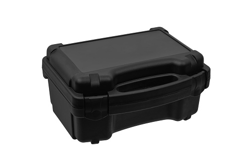 Black plastic case with foam inside. A box for storing and transporting a pistol. Weapon case isolate on white background.
