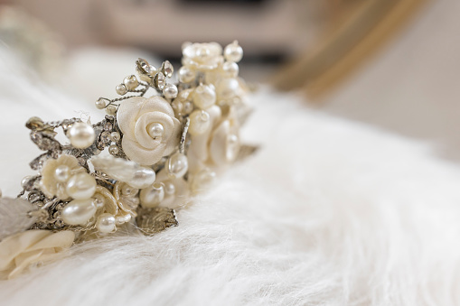 Pearl tiara on a plush background