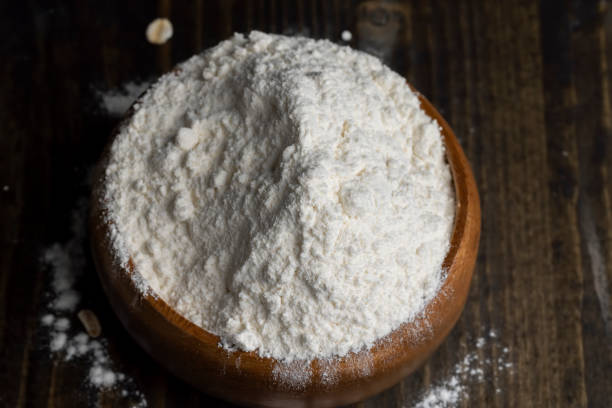 istock Wheat flour from a wooden bowl 1498530479
