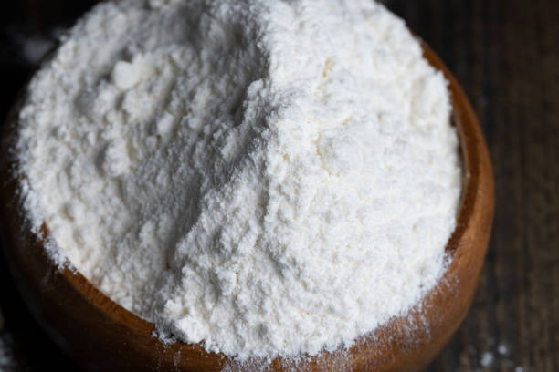 istock Wheat flour from a wooden bowl 1498530542