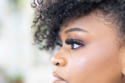 Black woman eyes in beauty salon