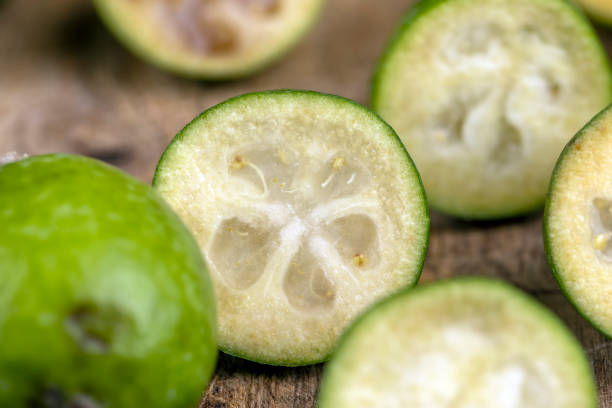 istock Ripe and soft green feijoa on the table 1498530675