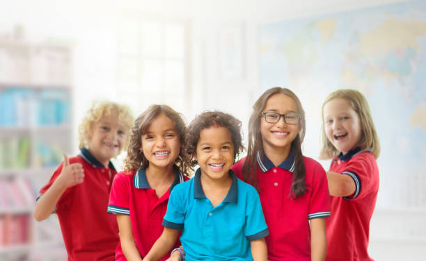 istock Kids in school. Children in class. 1498532193