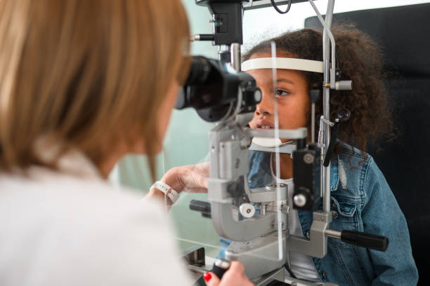 istock Slit Lamp Eye Control with Female Ophthalmologist 1498542393