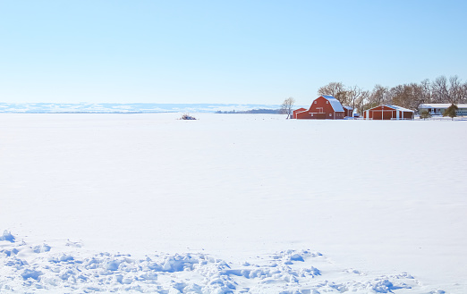 A red barn in the snow in rural North Dakota