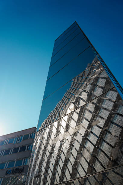 istock Low angle view of modern buildings against sky 1498551068