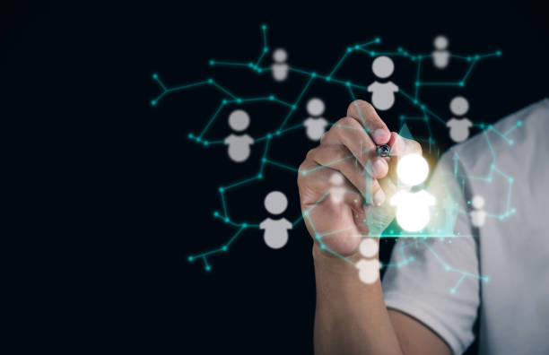 istock Selection concept. This is choosing person to join an organization or support a cause. A man points to a best person in hologram. Network society. 1498557706