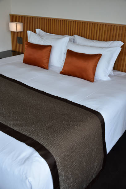 istock bed room in a hotel 1498557723