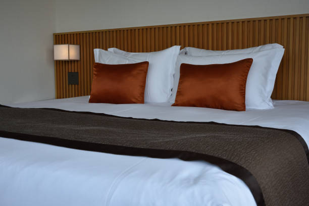 istock bed room in a hotel 1498557789