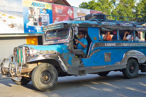 Loay, Bohol, Philippines, 06.11.2023, regular passenger transport, jeepneys, on the O. B. Clarin Bridge, Loboc river