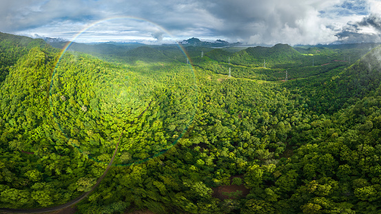 A drone captures a panorama of a rare circular rainbow that forms in northern Thailand's forests: Baan Pang Puai, Nasak, Mae Moh, and Lampang.