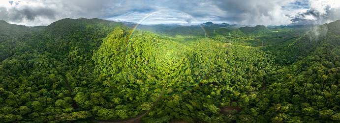 A drone captures a panorama of a rare circular rainbow that forms in northern Thailand's forests: Baan Pang Puai, Nasak, Mae Moh, and Lampang.