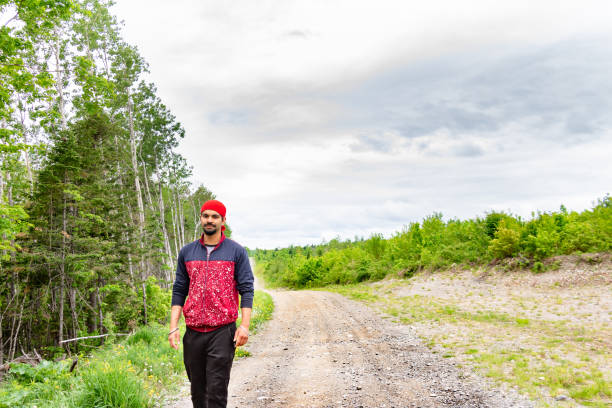 divorced sad man wandering in forest