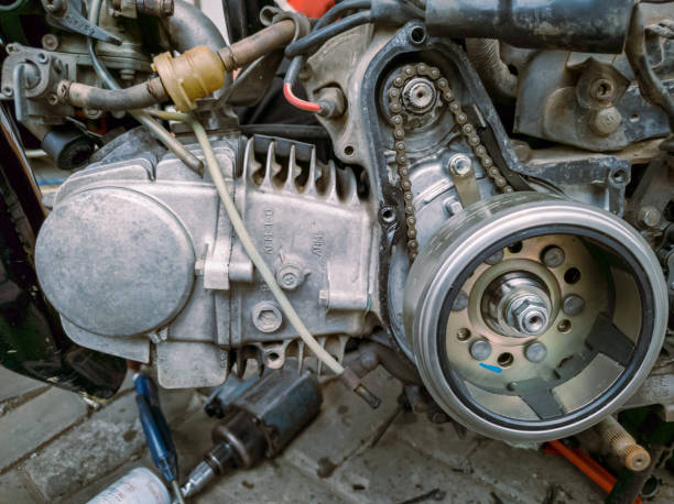 istock motorcycle engine mechanism that uses a timing chain, motorcycle engine that is being overhauled 1498572661