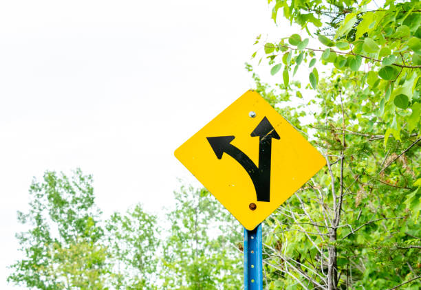 diverting arrow yellow sign
